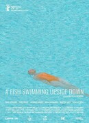 Рыба, плавающая брюхом вверх
